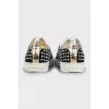 Sneakers decorated with beads and rhinestones