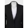 Black suit consisting of a jacket and trousers
