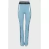 Tracksuit of trousers and a top