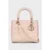 Розовая сумка Lady Dior