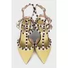 Туфлі Rockstud жовтого кольору