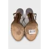 Sandals decorated with a snake