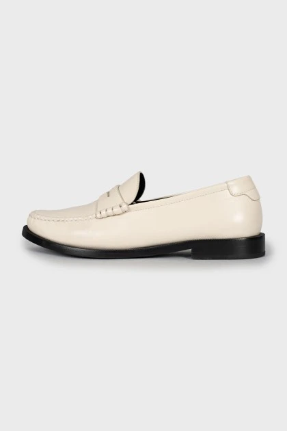 White leather loafers