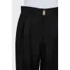 Trousers with ties at the bottom