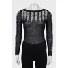 Jumper decorated with perforation