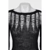 Jumper decorated with perforation