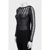 Jumper decorated with perforation