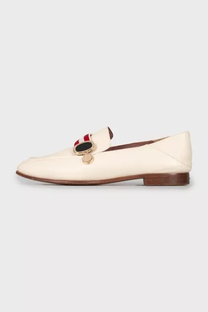 Leather loafers with textile decor