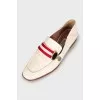 Leather loafers with textile decor