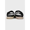 Leather sandals with woven soles