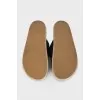 Leather sandals with woven soles