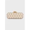 Leather clutch with golden skulls