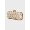 Leather clutch with golden skulls