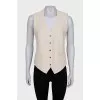 Beige vest with buttons