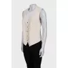 Beige vest with buttons