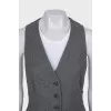 Fitted vest with buttons