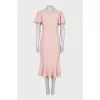 Fitted dress with a flounce at the bottom