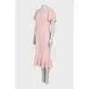 Fitted dress with a flounce at the bottom