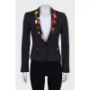Cropped jacket with floral print on lapels