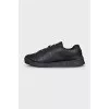 Black leather sneakers