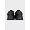 Black leather sneakers