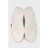 White leather sneakers with print