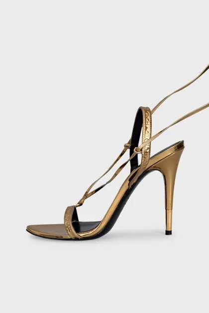 Leather lace-up sandals with tassels