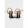 Leather lace-up sandals with tassels