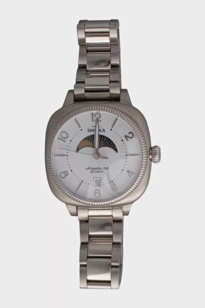 Silver watch with tag