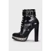 Leather ankle boots with metal elements