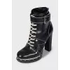 Leather ankle boots with metal elements