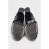 Leather ankle boots with metal elements