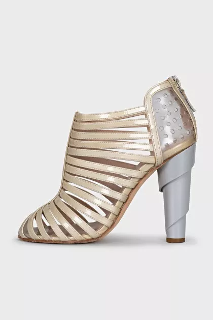 Golden shoes with figured heels