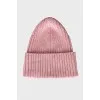 Knitted pink hat with embroidery