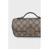Bag with signature print on chain