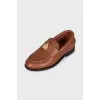 Brown loafers with gold decor