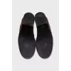 Brown loafers with gold decor