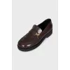 Brown leather loafers