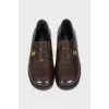 Brown leather loafers