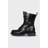 Leather boots with signature print