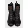 Leather boots with signature print