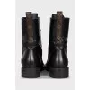Leather boots with signature print