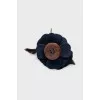 Brooch in the form of a flower made of textile