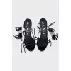 Sandals with leather laces