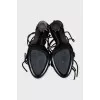Sandals with leather laces