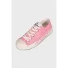 Pink sneakers with signature print