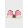 Pink sneakers with signature print