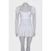 White mini dress with puff sleeves