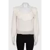 White blouse with a figured collar