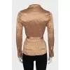 Fitted blouse made of crushed silk